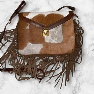 Genuine Leather and Real Hair on Hide Bag with Fringe
Unique pattern!